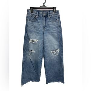 American Eagle Jeans
Womens Wide Leg
Distresssed Mom Jeans Raw
Hem Size 8